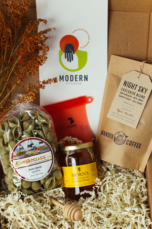 Modern Epicurean Fall 2018 Curated Local Food Gift Box with Wander Coffee, Bjorn's Traditional Raw Honey, Papardelle's Basil Garlic Pasta, Wooden Honey Dipper, and POINT. Sandwich Bags